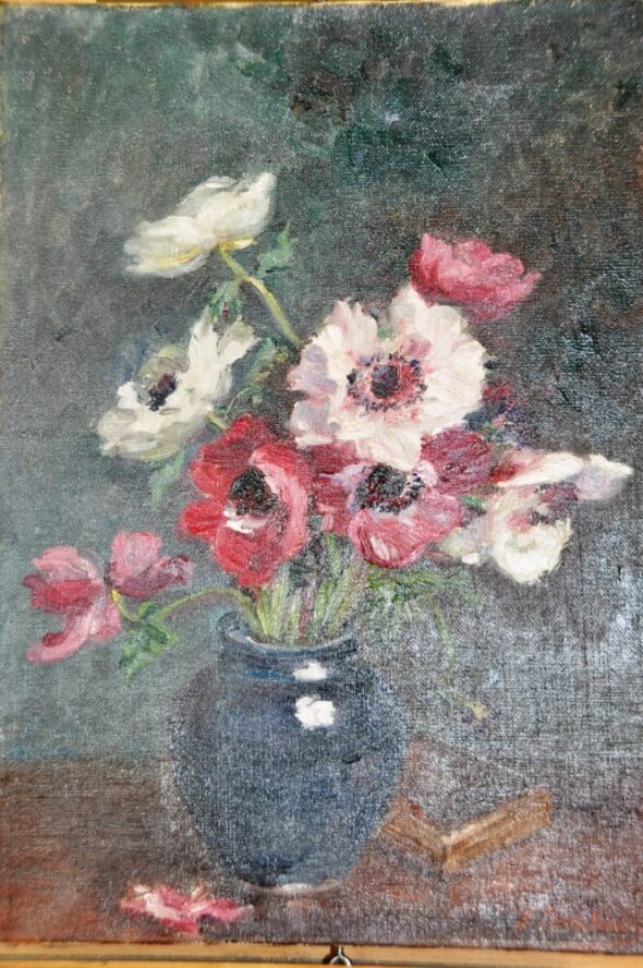 Tableau pendant le repulpage Étape de repulpage sur un tableau ancien de fleurs à l’huile, consolidation de la peinture soulevée.