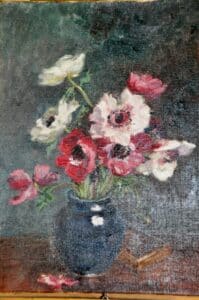 Processus de repulpage en cours sur une peinture ancienne, remise en place de la matière picturale.